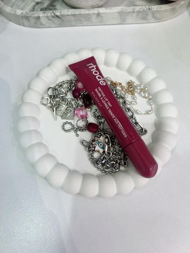 Lip gloss Rhode vs Feal