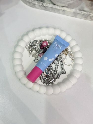 Lip gloss Rhode vs Feal