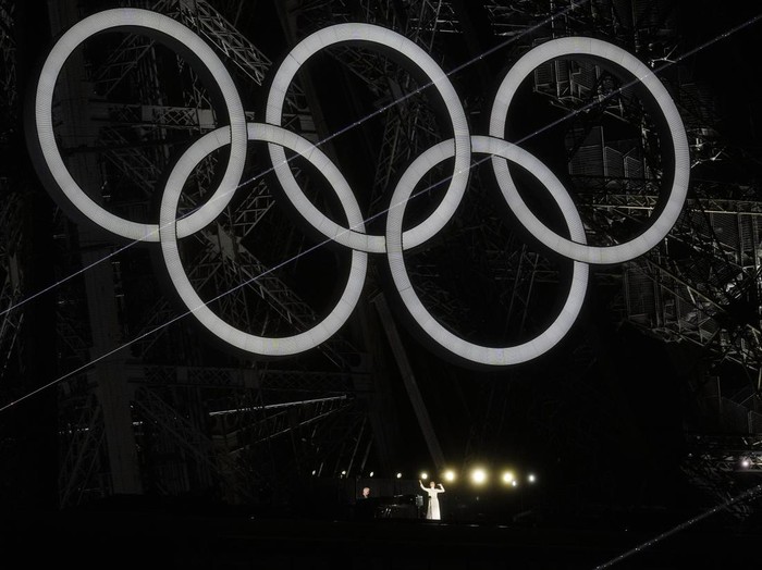 Singer Celine Dion performs from the Eiffel Tower in Paris, France, during the opening ceremony of the 2024 Summer Olympics, Friday, July 26, 2024. (AP Photo/Abbie Parr)