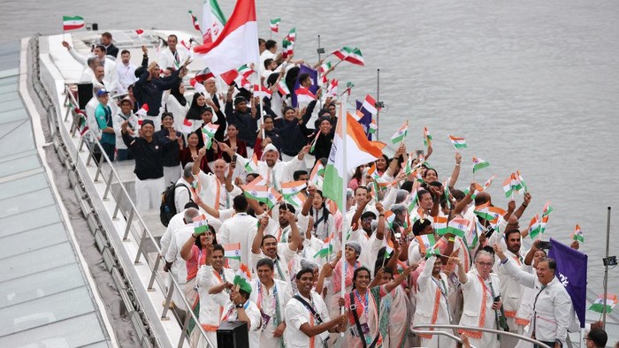 PARIS, FRANCE - JULY 26: Team India, Team Indonesia and Team Islamic Republic of Iran cruise on the River Seine during the athletes’ parade during the opening ceremony of the Olympic Games Paris 2024 on July 26, 2024 in Paris, France. (Photo by Lars Baron/Getty Images)