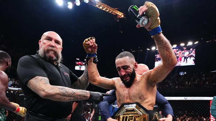 MANCHESTER, ENGLAND - JULY 27: Belal Muhammad reacts after his victory against Leon Edwards of Jamaica in the UFC welterweight championship bout during the UFC 304 event at Co-op Live on July 27, 2024 in Manchester, England.  (Photo by Chris Unger/Zuffa LLC via Getty Images)