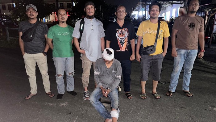 Buronan pelaku pencurian uang senilai Rp 1 miliar saat ditangkap polisi
