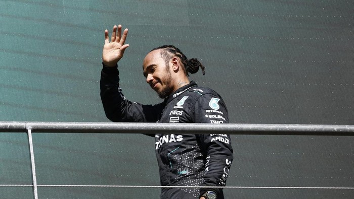 Formula One F1 - Belgian Grand Prix - Circuit de Spa-Francorchamps, Stavelot, Belgium - July 28, 2024 Mercedes Lewis Hamilton celebrates on the podium after finishing second in the Belgian Grand Prix REUTERS/Johanna Geron