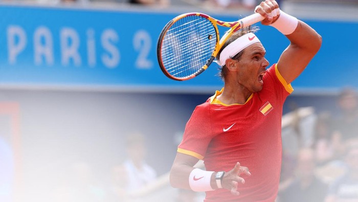 Paris 2024 Olympics - Tennis - Mens Singles First Round - Roland-Garros Stadium, Paris, France - July 28, 2024. Rafael Nadal of Spain in action during his first round match against Marton Fucsovics of Hungary. REUTERS/Claudia Greco