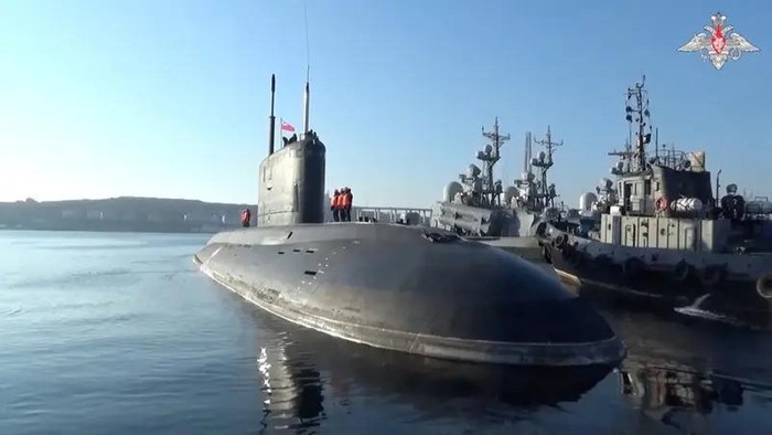 Russian sailors line up onboard a submarine, which is involved in drills held by the Pacific Fleet of the Russian Navy in the waters of the Pacific Ocean, the Sea of Japan and the Sea of Okhotsk, before leaving the port of Vladivostok, Russia, in this still image from video published June 18, 2024. (Reuters)