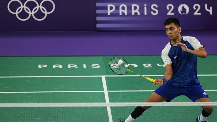 Langkah Jonatan Christie Terhenti di Fase Grup Olimpiade Paris 2024 Paris 2024 Olympics - Badminton - Men's Singles Group play stage - Porte de La Chapelle Arena, Paris, France - July 31, 2024. Jonatan Christie of Indonesia in action during the Group L match against Lakshya Sen of India. REUTERS/Hamad I Mohammed