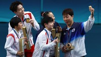 Ini juga kali pertama Korut memenangi medali di Olimpiade sejak 2016, juga termasuk karena mereka tidak ikut serta di Olimpiade Tokyo 2021. REUTERS/Stephanie Lecocq