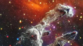 M16 (Eagle Nebula) adalah wilayah pembentukan bintang yang disebut Pilar Penciptaan. Kolom abu-abu berawan dikelilingi oleh lusinan titik-titik lembut, bercahaya, putih, merah, biru, kuning, dan ungu yang merupakan bintang muda yang memancarkan sinar-X dan cahaya inframerah. Chandra mendeteksi sinar-X dari bintang-bintang muda di wilayah tersebut, termasuk satu yang tertanam dalam pilar – Kredit: sinar-X: NASA/CXO/SAO; Inframerah: NASA/ESA/CSA/STScI; Pemrosesan gambar: NASA/CXC/SAO/L. Frattar