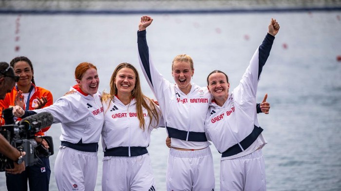 PARIS, FRANCE - JULY 31: Lauren Henry, Hannah Scott, Lola Anderson and Georgina Brayshaw of Team Great Britain celebrate at the Rowing Womens Quadruple Sculls medal ceremony on day five of the Olympic Games Paris 2024 at Vaires-Sur-Marne Nautical Stadium on July 31, 2024 in Paris, France. (Photo by Kevin Voigt/GettyImages)