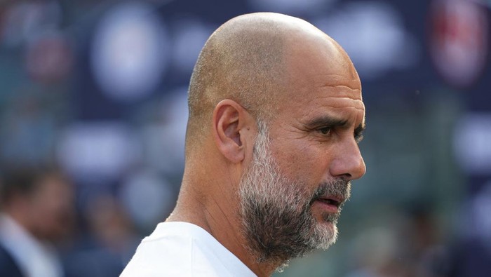 Jul 27, 2024; New York, NY, USA; Manchester City head coach Pep Guardiola looks before the match against AC Milan at Yankee Stadium. Mandatory Credit: Lucas Boland-USA TODAY Sports