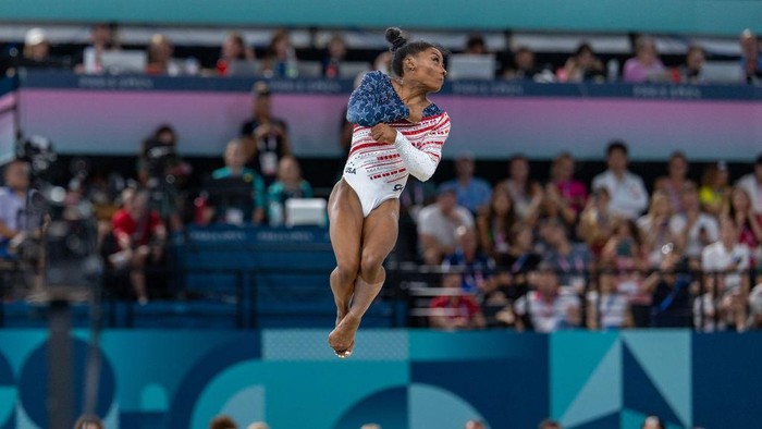 PARIS, FRANCE - JULY 30: Simone Biles of United States competes during the Artistic Gymnastics Womens Team Final on day four of the Olympic Games Paris 2024 at Bercy Arena in Paris, France on July 30, 2024. (Photo by Aytac Unal/Anadolu via Getty Images)