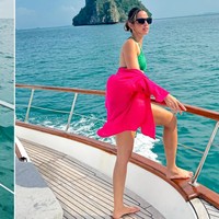 Tampil bak ABG, Nia mengenakan set bikini berwarna hijau dipadukan dengan kemeja berwarna fuschia yang dijadikan sebagai outer. Ia juga melengkapi penampilannya dengan sebuah kaca mata hitam. Foto: Instagram/@ramadhaniabakrie