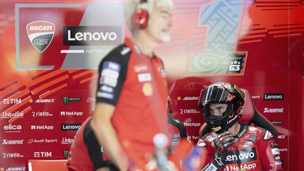 NORTHAMPTON, ENGLAND - AUGUST 02: Francesco Bagnaia of Italy and Ducati Lenovo Team looks on in box during the MotoGP Of Great Britain - Free Practice at Silverstone Circuit on August 02, 2024 in Northampton, England. (Photo by Mirco Lazzari gp/Getty Images)