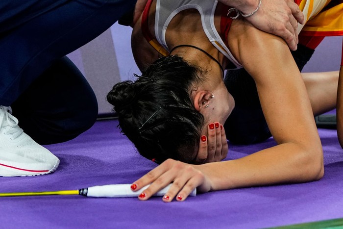 Carolina Marin PARIS, FRANCE - AUGUST 04: Carolina Marin of Spain is injured in the second set and leaves the match against Bing Jiao He of China during Women's Singles Semifinal of the Badminton on La Chapelle Arena Court 1 during the Paris 2024 Olympics Games on August 4, 2024 in Paris, France. (Photo By Oscar J Barroso/Europa Press via Getty Images)