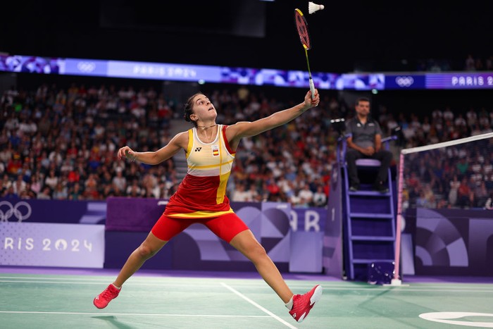 PARIS, FRANCE - AUGUST 03:  Carolina Marin of Team Spain competes in their Women's Singles Match against Aya Ohori of Team Team Japan on day eight of the Olympic Games Paris 2024 at Porte de La Chapelle Arena on August 03, 2024 in Paris, France. (Photo by Elsa/Getty Images)