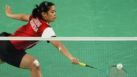 Gregoria merebut gim pertama dengan skor 21-11 dalam durasi 18 menit. Pukulan ke arah backhand An Se-young, dikembalikan menyangkut net. REUTERS/Hamad I Mohammed 