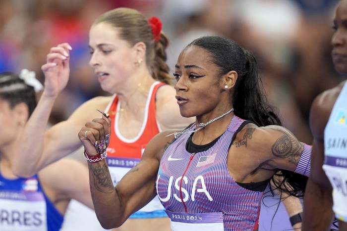 Shacarri Richardson of the United States, wins a heat in the womens 100-meter run at the 2024 Summer Olympics, Friday, Aug. 2, 2024, in Saint-Denis, France. (AP Photo/Petr David Josek)