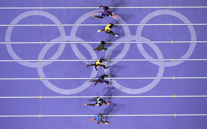 Noah Lyles, of the United States, celebrates after winning the mens 100-meters final at the 2024 Summer Olympics, Sunday, Aug. 4, 2024, in Saint-Denis, France. (AP Photo/Matthias Schrader)
