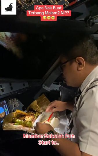 Pilot Ini Terbangkan Pesawat Sambil Asyik Makan Ikan Bakar
