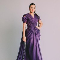 Untuk parade, Raisa mengenakan gaun rancangan Jessie Gunawan. Gaun yang menonjolkan keanggunan ini tampak indah dengan aksen drapery. Foto: Instagram/@wardhanachandra @bubahalfian @raisa6690