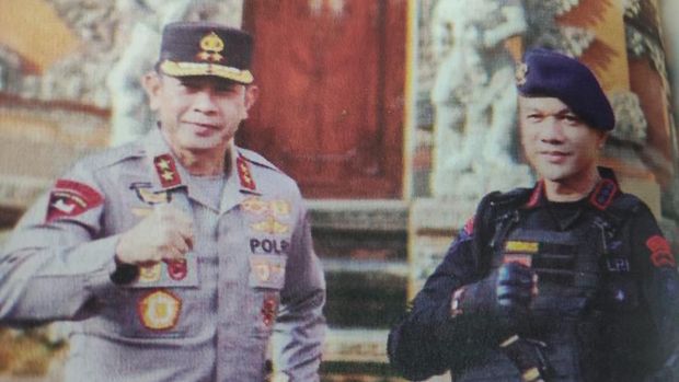 Kombes Firdaus Wulanto (seragam hitam)