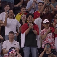 Gregoria Mariska Tunjung telah mengharumkan nama Indonesia di kancah dunia. Mikha Angelo terlihat berdiri di area tribun untuk mendukung kekasihnya selama pertandingannya di Olimpiade Paris 2024. Foto: Instagram