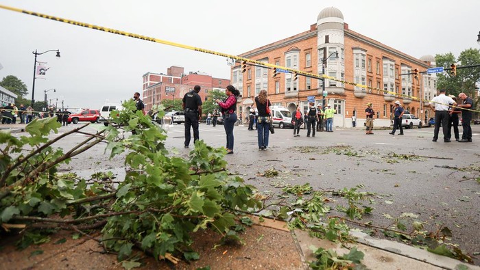 A crew removes a fallen tree in the aftermath of tornadoes that hit Buffalo, New York, U.S., August 5, 2024. REUTERS/Lindsay DeDario