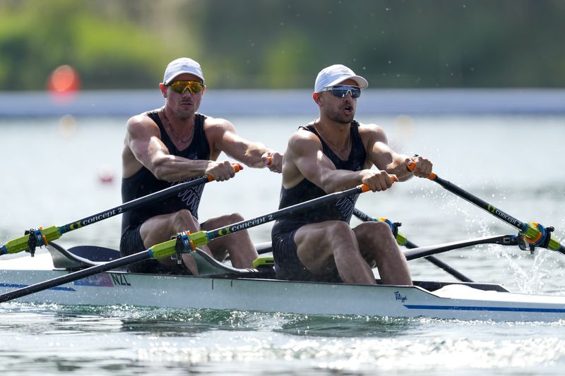 New Zealand's Robbie Manson and Jordan Parry compete in the men's double sculls rowing semifinal at the 2024 Summer Olympics, Tuesday, July 30, 2024, in Vaires-sur-Marne, France. (AP Photo/Lindsey Wasson)