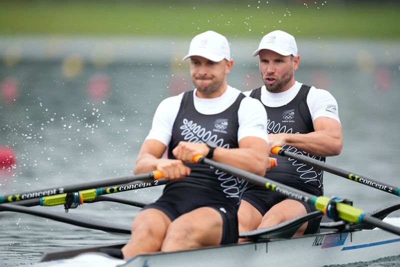 Robbie Manson, and Jordan Parry, of New Zealand, compete during the men's rowing double sculls heat at the 2024 Summer Olympics, Saturday, July 27, 2024, in Vaires-sur-Marne, France. (AP Photo/Ebrahim Noroozi)