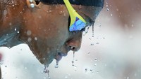 Sara Curtis dari Italia berlaga di nomor cipratan air sebelum semifinal renang gaya bebas 50 meter putri di Olimpiade Musim Panas di Nanterre, Prancis. AP/Natacha Pisarenko
