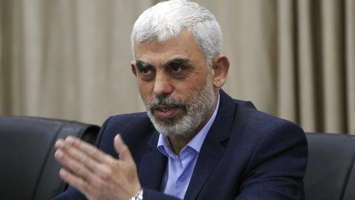 Yahya Sinwar, head of Hamas in Gaza, delivers a speech during a meeting with people at a hall on the sea side of Gaza City, Saturday, April 30, 2022. (AP Photo/Adel Hana)