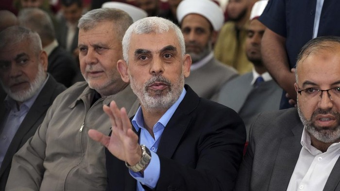 Yahya Sinwar, head of Hamas in Gaza, delivers a speech during a meeting with people at a hall on the sea side of Gaza City, Saturday, April 30, 2022. (AP Photo/Adel Hana)