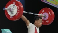 Pada clean & jerk, Eko gagal pada percobaan pertama di 162kg. Hal serupa terjadi di percobaan kedua. Lifter 35 tahun ini sama sekali tak bisa mengeksekusi angkatannya di clean & jerk. AP/Kin Cheung