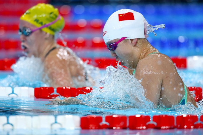 NANTERRE, FRANCE - AUGUST 03: Tang Qianting of Team Peoples Republic of China competes in the Womens 4x100m Medley Relay Heats on day eight of the Olympic Games Paris 2024 at Paris La Defense Arena on August 03, 2024 in Nanterre, France. (Photo by Adam Pretty/Getty Images)