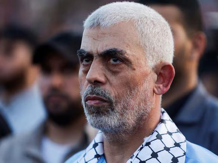 Hamas leader Yehya Al-Sinwar looks on as palestinians Hamas supporters take part in an anti-Israel rally over tension in Jerusalems Al-Aqsa mosque, in Gaza City October 1, 2022. REUTERS/Mohammed Salem/File Photo Purchase Licensing Rights
