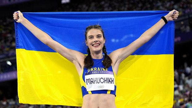Yaroslava Mahuchikh, of Ukraine, competes in the women's high jump final at the 2024 Summer Olympics, Sunday, Aug. 4, 2024, in Saint-Denis, France. (AP Photo/Matthias Schrader)