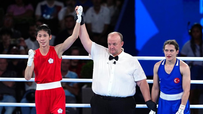 Chinese Taipeis Lin Yu Ting (left) celebrates following victory against Turkeys Esra Yildiz Kahraman during the Womens 57kg semifinal bout at Roland-Garros Stadium on the twelfth day of the 2024 Paris Olympic Games in France. Picture date: Wednesday August 7, 2024. (Photo by Peter Byrne/PA Images via Getty Images)