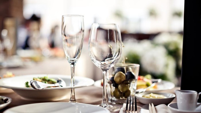 Empty glasses set in restaurant. Part of interior