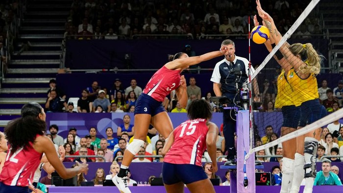 PARIS, FRANCE - AUGUST 8: Avery Skinner of United States #3 strikes against Team Brazil during the Womens Semifinals on day thirteen of the Olympic Games Paris 2024 at Paris Arena on August 8, 2024 in Paris, France. (Photo by Jari Pestelacci/Eurasia Sport Images/Getty Images)