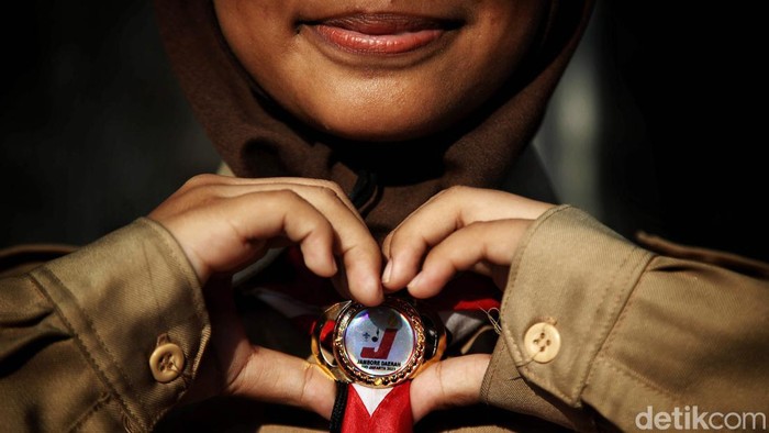 Pramuka menggelar bakti sosial menjelang perayaan HUT di Tanjung Priok, Jakarta Utara, Jumat (9/8/2024).