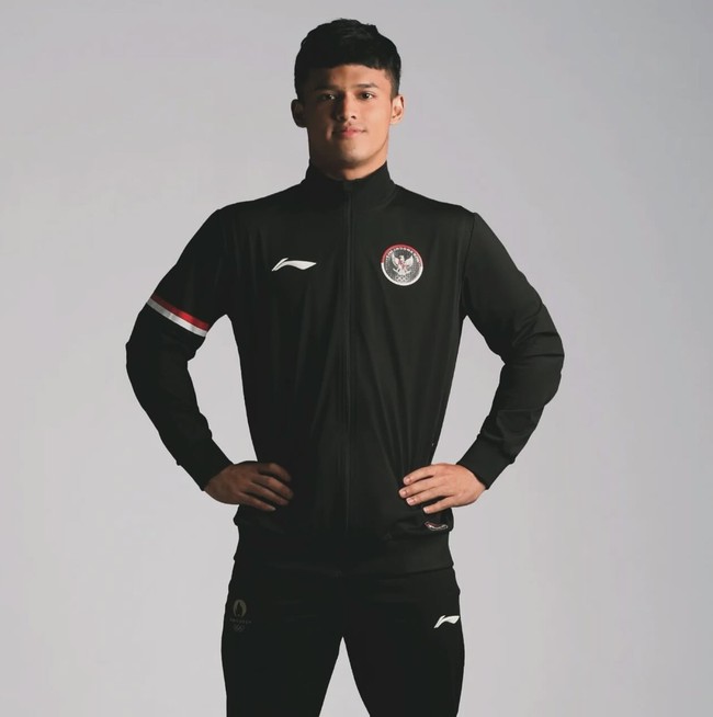 Atlet angkat besi Rizki Juniansyah tengah jadi sorotan karena prestasi yang ditorehkannya baru-baru ini. Ia berhasil memperoleh emas kedua untuk Indonesia di Olimpiade Paris 2024. Foto: Instagram/@rjuniansyah_