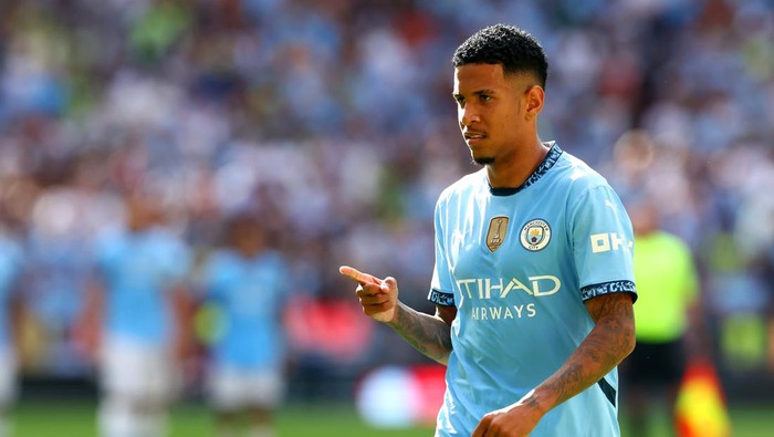 LONDON, ENGLAND - AUGUST 10: Savinho of Manchester City celebrates scoring in the penalty shoot-out following the 2024 FA Community Shield match between Manchester United and Manchester City  at Wembley Stadium on August 10, 2024 in London, England. (Photo by Chris Brunskill/Fantasista/Getty Images)