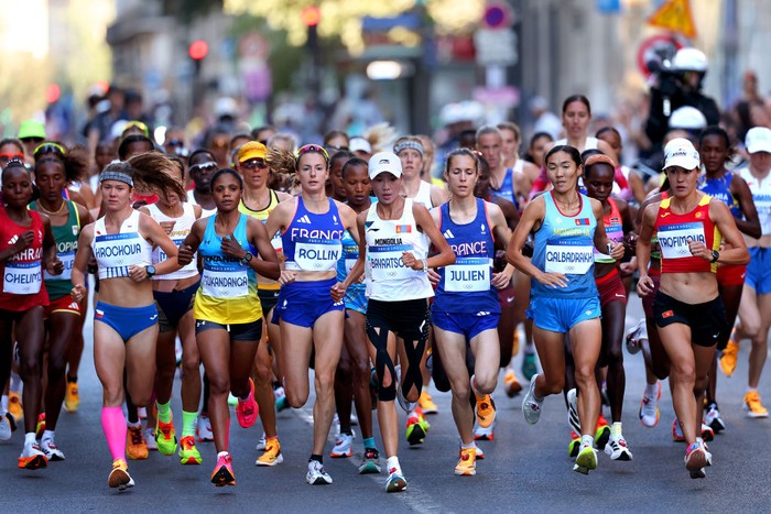 PARIS, FRANCE - AUGUST 11: Athletes compete during the Women's Marathon on day sixteen of the Olympic Games Paris 2024 at Esplanade Des Invalides on August 11, 2024 in Paris, France. (Photo by Christian Petersen/Getty Images)