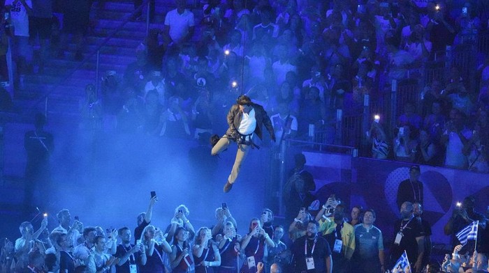 Tom Cruise is lowered into the stadium during the 2024 Summer Olympics closing ceremony at the Stade de France, Sunday, Aug. 11, 2024, in Saint-Denis, France. (AP Photo/Martin Meissner)