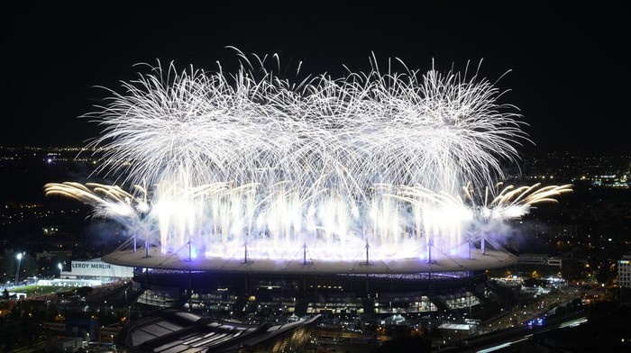 Fireworks signal the end of the 2024 Summer Olympics closing ceremony taking place at the Stade de France, Monday, Aug. 12, 2024, in Saint-Denis, France. (AP Photo/Luca Bruno)