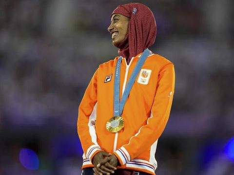 Women's marathon gold medalist Sifan Hassan, of the Netherlands, stands on the podium during the 2024 Summer Olympics closing ceremony at the Stade de France, Sunday, Aug. 11, 2024, in Saint-Denis, France. (AP Photo/Natacha Pisarenko)