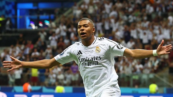 WARSAW, POLAND - AUGUST 14:  Kylian Mbappe of Real Madrid celebrates scoring a goal to make the score 2-0 during the UEFA Super Cup 2024 match between Real Madrid and Atalanta BC at National Stadium on August 14, 2024 in Warsaw, Poland. (Photo by Chris Brunskill/Fantasista/Getty Images)