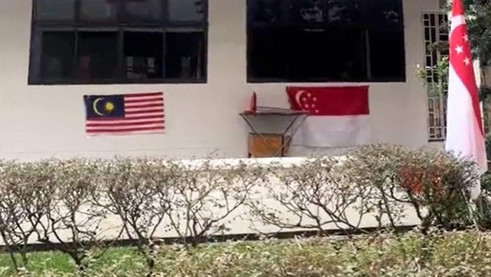 Bendera Malaysia di rusun Singapura/SG Daily via Asiaone