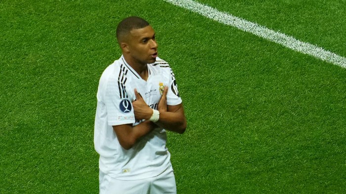 Soccer Football - Super Cup - Real Madrid v Atalanta - National Stadium, Warsaw, Poland - August 14, 2024 Real Madrids Kylian Mbappe celebrates scoring their second goal REUTERS/Aleksandra Szmigiel