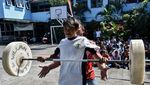 Rizki Juara Olimpiade, Angkat Beban Mencari Bibit Baru